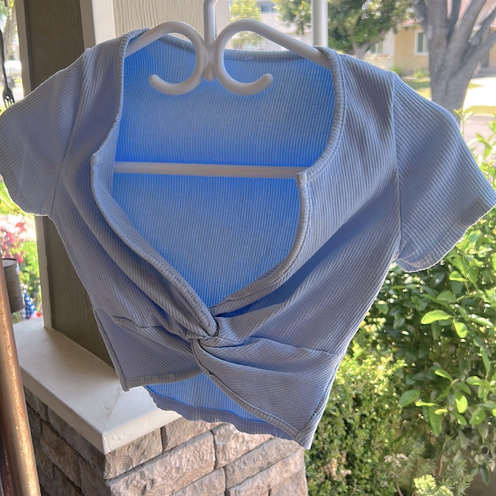Super Cute Light Baby Blue shirt that essencuates the boobies ❤️